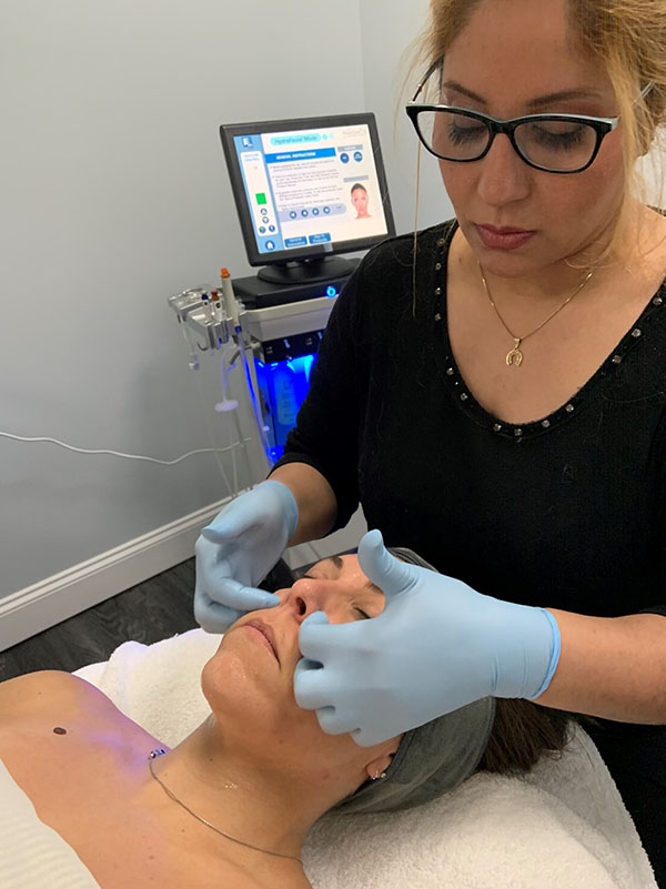 nurse injecting fillers on patient